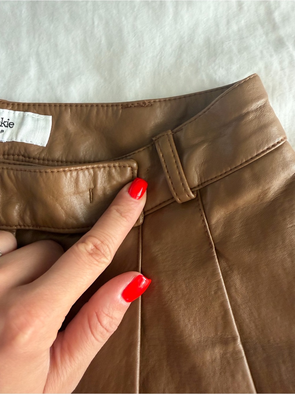 The Frankie Shop Pernille Pleated Faux Leather Shorts in Brown - Picture 10 of 16